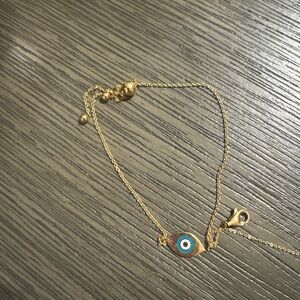 Gold-Tone Evil Eye Bracelet with Blue and White Accent